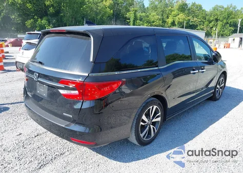 2021 Honda Odyssey Touring z USA, uszkodzony, nr VIN 5FNRL6H84MB027396